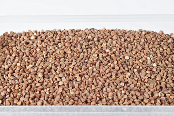 Texture of buckwheat. Many buckwheat on a pile closeup.
