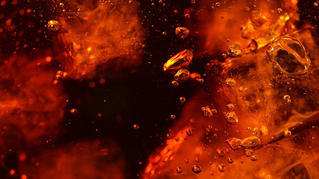 Detail of cola drink with ice cubes