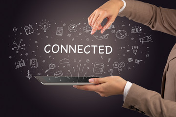 Close-up of a touchscreen with CONNECTED inscription, social media concept