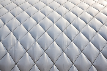 White cover above tennis court in the winter. Tennis hall roofing background.