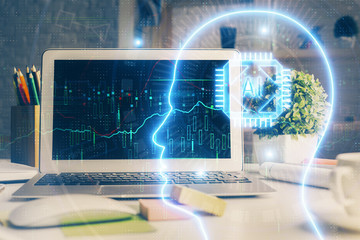 Double exposure of work space with computer and human brain drawing hologram. Brainstorm concept.