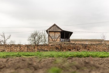 old barn in field