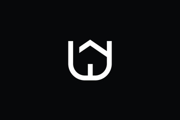 Logo design of U W in vector for construction, home, real estate, building, property. Minimal awesome trendy professional logo design template on black background.