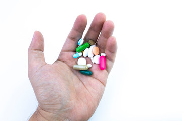 Medical / surgical face mask on hand cart and anti-virus hand sanitizer.Covid-19 concept.White background medicine and men's hands