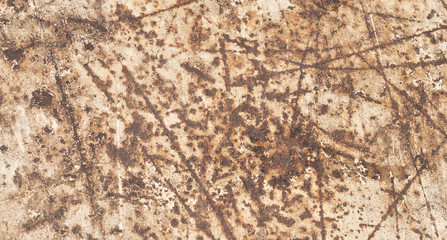 Rusty metal texture grunge background with old dirty brown stain pattern on damaged steel wall surface.