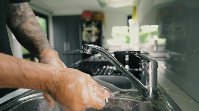 A man washing his hands with foam hand wahs for corona virus prevention, hygiene to stop spreading coronavirus.