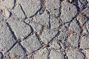 Fototapeta premium Cracked grey asphalt city heat summer heat
