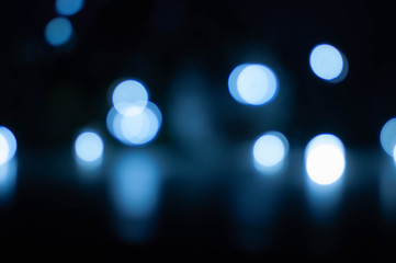 beautiful white and blue bokeh on a dark background