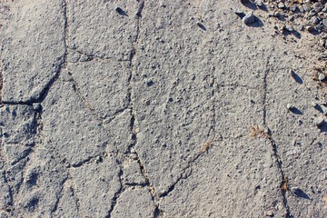 Cracked grey asphalt city heat summer heat