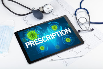 Close-up view of a tablet pc with PRESCRIPTION inscription, microbiology concept