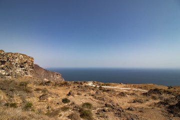 Fototapeta premium Mountains behind Fazayat beach near salalah in Oman