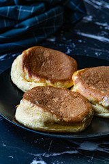 Homemade Plain Fluffy Souffle Pancake in Black Plate Ready to Eat.