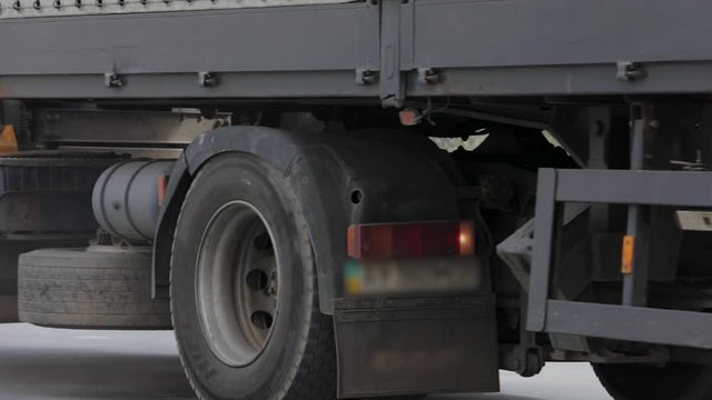 Wheel of a truck close-up, truck puts back close-up