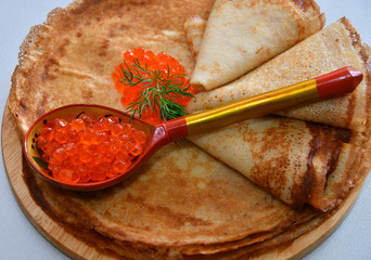 Pancakes with red caviar