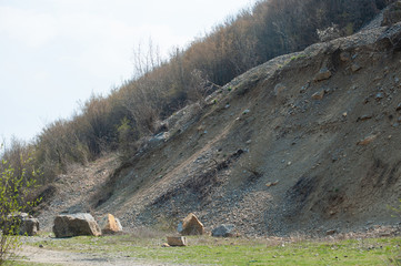 Open trees roots due to landslides, soil erosion, after road cut