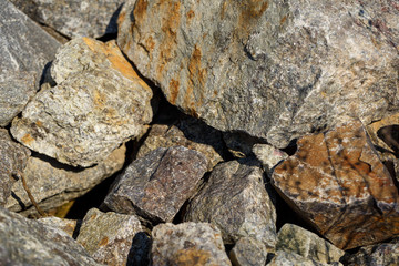 large natural stones piled up in the bright sun
