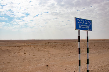 Roadsign along Highway no 31 through dsert in Oman between Salalah and Nizwa