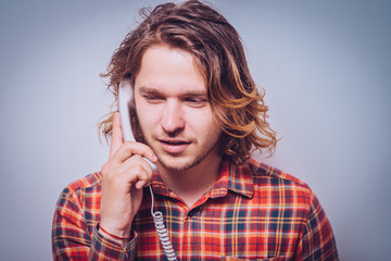 man talking on landline