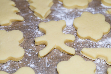 cooking homemade delicious cookies of different figures from the dough