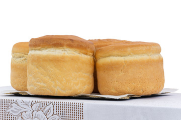 Artos is a large, whole prosphora, sacred bread in the Orthodox religion. Easter tall cylindrical unleavened bread, blessed on Easter Day.
