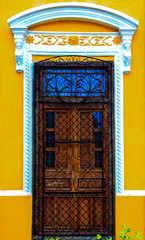 Yellow door in Merida, Yucatan. Mexico.