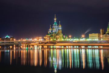 Fototapeta na wymiar Cathedral of the Annunciation at night, Malaya Kokshaga river, Russia, Yoshkar-Ola