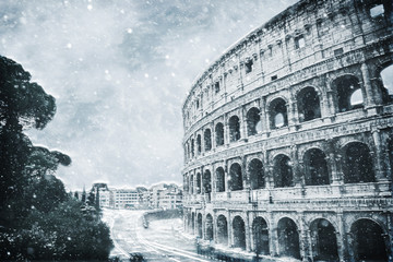 Curving wall of the Colosseum, Rome in snow