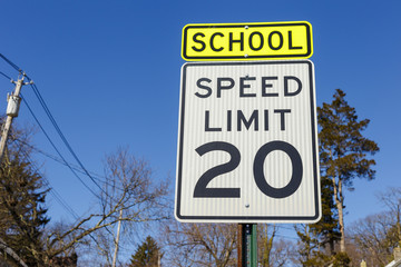 Road sign displaying 20 mph speed limit warning
