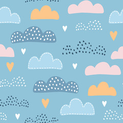 Seamless pattern with cloud and rainbow in the sky.