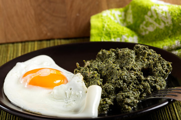 Nettle stew with a fried egg