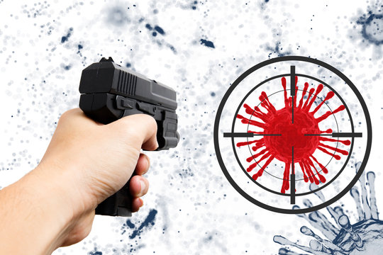 Kill the Virus concept. Man aim gun shot to coronavirus for protection or combat and fighting disease .