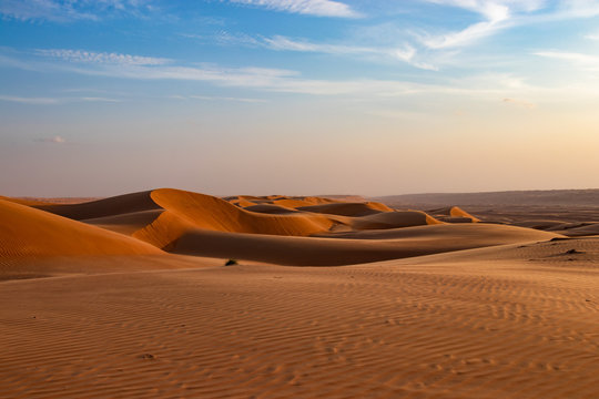 View on sand dune in Wahiba sands desert near Bidiyya in Oman