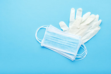 Hygienic mask, Medical protective masks and white rubber gloves. Coronavirus, Covid-19 protection by respirator, surgical face mask, hand hygiene.Concept medicine health care.Medical sterile equipment