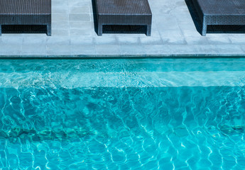 Background image of a clear turquoise pool