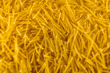Noodles seen from above for a delicious soup, macro photography