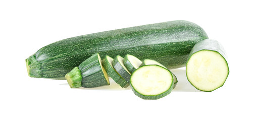 Fresh green zucchini with slice isolated on white background.