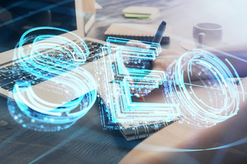 Multi exposure of woman's hands making notes with SEO icon. Concept of Search engine optimization