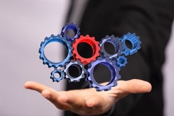 Business, Internet and technology concept. Business select gear icon on virtual screen.