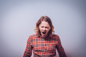 Angry man screaming