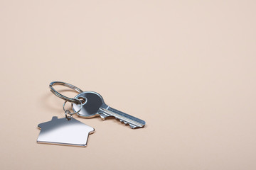 Closeup of the key with house shaped keychain