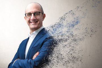 smiling businessman dissolving in the air