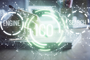 Cryptocurrency hologram, bitcoin, ico theme over hands taking notes background. Concept of...