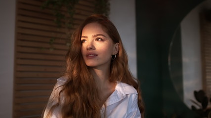 Portrait Of Beautiful Red-Haired Girl.