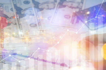 Double exposure of graph and rows of coins for finance and business concept