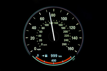 120 Kilometers per hour,light with car mileage with black background,number of speed,Odometer of car.	
