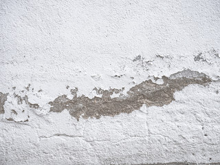 White wall with cracks, wrinkles and demormations perfect for materials, illustrations, textures