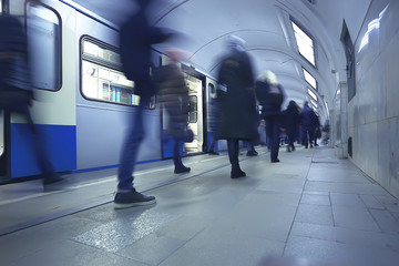 crowd of people metro in motion blurred, abstract background urban traffic people