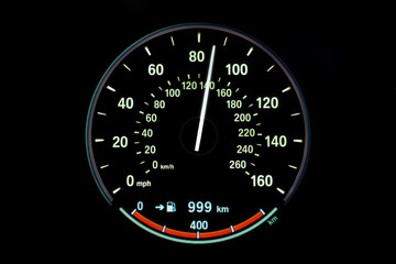 140 Kilometers per hour,light with car mileage with black background,number of speed,Odometer of...