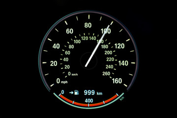 160 Kilometers per hour,light with car mileage with black background,number of speed,Odometer of car.	
