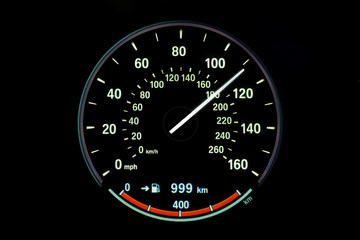180 Kilometers per hour,light with car mileage with black background,number of speed,Odometer of car.	

